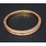 A 9ct rose gold bangle. Weight 16.4g