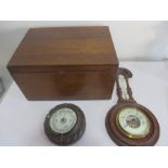 Two barometers along with a wooden box