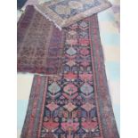 Two Eastern rugs along with a runner