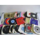 A selection of 7" single records including Motown, Jethro Tull, Simon & Garfunkel etc