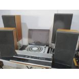 A Bang & Olufsen sound system consisting of a beogram 1102, Beomaster 2400,two pairs of Beovox