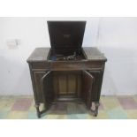 A vintage gramophone in cabinet A/F