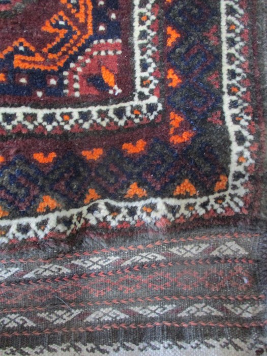 A red ground rug - Image 2 of 6