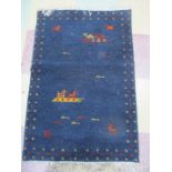 A small blue ground Gabbeh rug