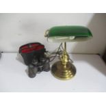 A bankers desk lamp with green shade, and a pair of Miranda binoculars