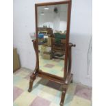 A Victorian mahogany cheval mirror