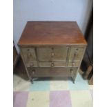 A Georgian Mahogany Campaign Chest of Drawers/Commode with perfume bottles in fitted draw (1