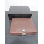 A Dunhill humidor along with one other