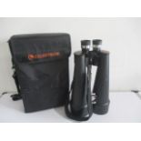 A pair of Celestron SkyMaster 25x100 high powered waterproof binoculars in original carry bag