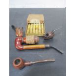 A small quantity of smoking pipes including two novelty versions along with a box of Leichner no. 20