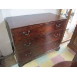 A Georgian Mahogany Chest of three graduated drawers on bracket feet