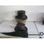 A German top hat by C Kriegshammer, Berlin in tatty cardboard hat box along with a collapsible