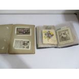 Two albums of vintage greeting cards etc