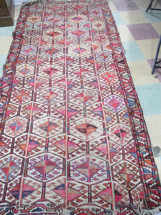 An Eastern hand woven rug