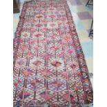 An Eastern hand woven rug
