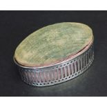 A hallmarked silver trinket box with pincushion top.