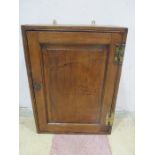 An antique elm hanging cupboard- key in office