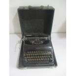 A Corona typewriter in carry case