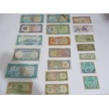 A collection of foreign bank notes