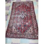 A red ground rug