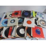 A selection of 7" single records including David Bowie, T-Rex, Rolling Stones etc