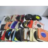 A collection of 7" single records including Queen, Deep Purple, Rolling Stones etc