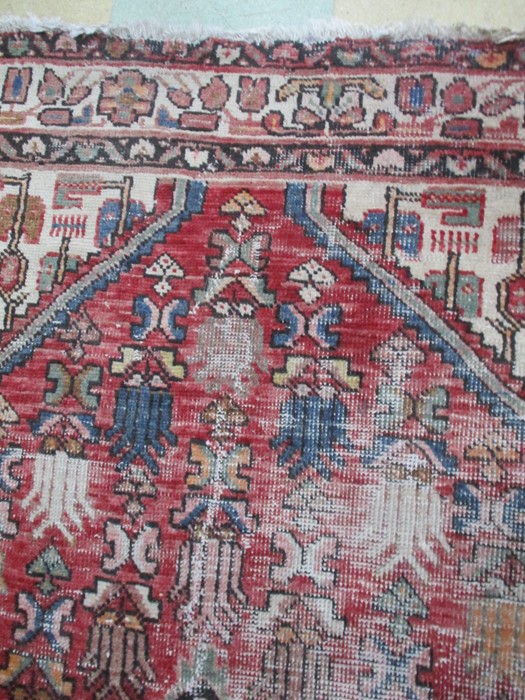 A red ground rug - Image 4 of 5