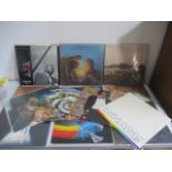 A collection of records including Moody Blues, Wham etc