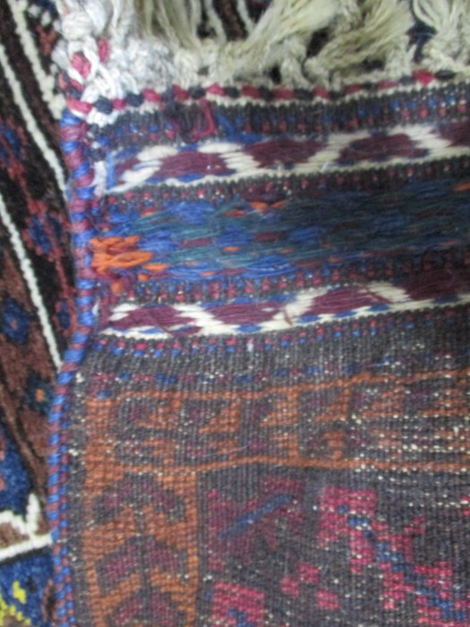 A red ground hand woven prayer rug - Image 4 of 5