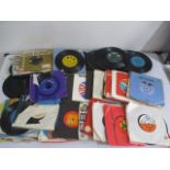 A collection of 7" single records including The Bee Gees etc