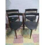 A set of four three legged Hans Olsen for Frem Rojle Danish chairs