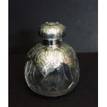 A Birmingham 1904 hallmarked silver topped scent bottle