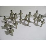 A set of six Quist Nagel style modular candlestick holders