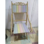 A folding deckchair style chair