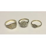 Two 9ct gold dress rings along with an 18ct gold diamond cluster ring (one diamond missing) Total