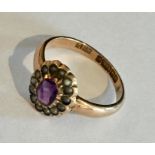 A 9ct gold ring with amethyst and pearls