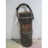 An antique leather fire bucket with Royal crest