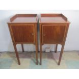 A pair of Georgian style inlaid pot cupboards