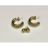 Two pairs of 9ct gold earrings