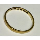 A 22ct gold wedding band. Weight 2.2g