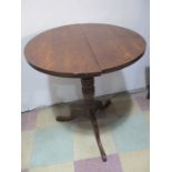 An antique oak tripod table ( top A/F)