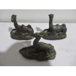 Two small bronze camel figures along with a deer