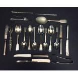 A collection of hallmarked silver and other cutlery.