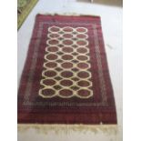 An Eastern red ground rug