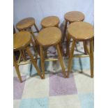 A set of six matched Ercol style stools