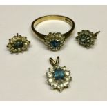 A 9ct gold diamond and topaz ring along with a 9ct topaz and CZ pendant and a pair of earrings.