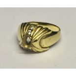 An 18ct gold dress ring set with diamonds (centre stone missing) Total weight 6.8g