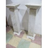 A near pair of marble pillars- 1 A/F