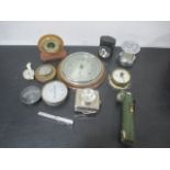 A selection of barometers, gauges, lamps, torch etc