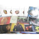 A collection of vinyl records including Diana Ross, Michael Jackson, Lionel Richie etc
